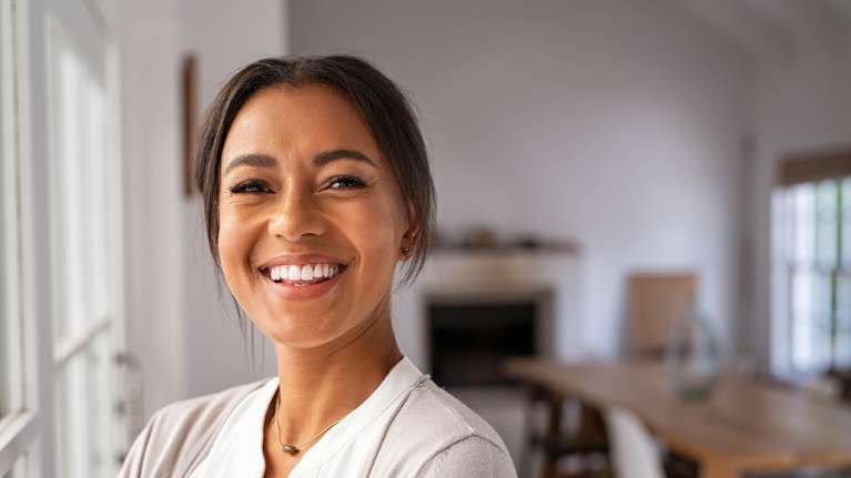 woman smiling with a straight smile